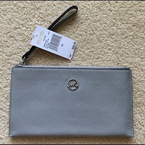 Brand new! Gray Michael Kors large zip clutch